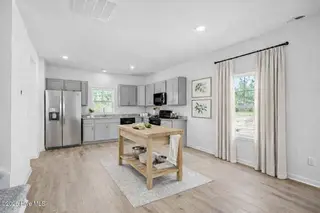 512 Bartley Street, Vass, NC 28394 – photo 8: Alsace Kitchen with Butcher Block Island