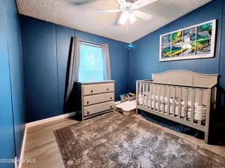623 Sandy Bluff Drive SW, Supply, NC 28462 — 3-bedroom manufactured home in Sandy Bluff, Supply, NC, photo 16 of 26: Features Ceiling Fan