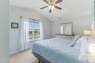 1803 W Yacht Drive, Oak Island, NC 28465 – photo 16: Front Bedroom