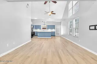 127 NW 19th Street, Oak Island, NC 28465 – photo 9: Open concept Living/dining room