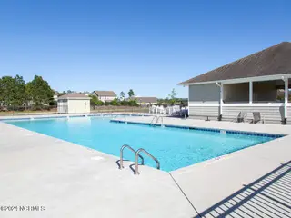 6338 Cowslip Way Unit 186, Leland, NC 28451 – photo 23: Seabrooke pool L33A2013-033-022-1280x960