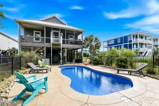 3702 E Dolphin Drive, Oak Island, NC 28465 – photo 5: shniderproductions.com-61