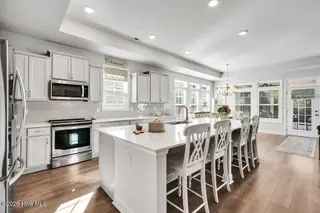 142 Rice Marsh Way, Wilmington, NC 28412 — 3-bedroom home in Bella Port, Wilmington, NC, photo 13 of 62: 142 RICE MARSH WAY - CHEF-STYLE KITCHEN