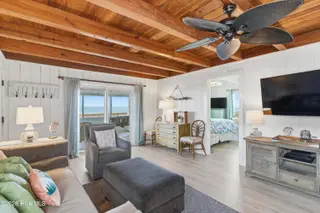707 W Beach Drive, Oak Island, NC 28465 – photo 11: 02-Living Room