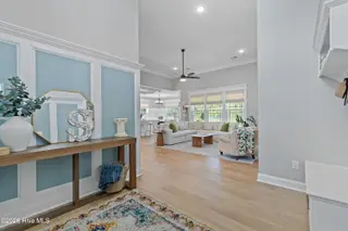299 Boundaryline Drive NW, Calabash, NC 28467 – photo 6: Foyer into Living Area