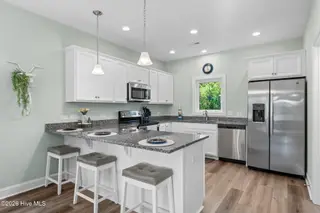334 NE 54th Street, Oak Island, NC 28465 – photo 10: 78-web-or-mls-CAMMediaLLC.com -300