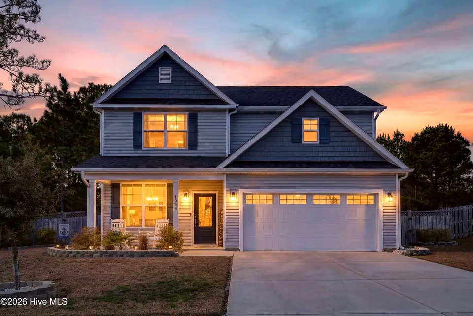 1003 Terraces Lane, Hampstead, NC 28443 – photo 1 of 52: 1003TerracesLane-2_Twilight_01