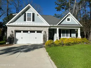 909 Oyster Pointe Drive, Sunset Beach, NC 28468 – photo 1: IMG_5359