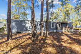 223 Pettiford Road, Peletier, NC 28584 — 3-bedroom manufactured home in Pettiford Point, Peletier, NC, photo 2 of 34: 37-web-or-mls-1S3A9927
