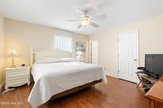 166 NW 7th Street, Oak Island, NC 28465 – photo 16: Master bedroom