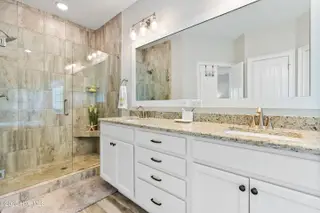 1353 Dunes Boulevard SW, Ocean Isle Beach, NC 28469 – photo 21: Tub and walk-in shower/toilet closet