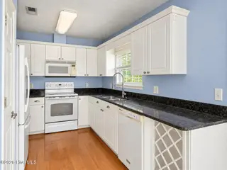 121 NE 6th Street, Oak Island, NC 28465 – photo 6: Kitchen View