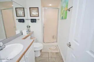 2909 Pointe West Drive 3b1, Emerald Isle, NC 28594 – photo 24: Hall Bathroom