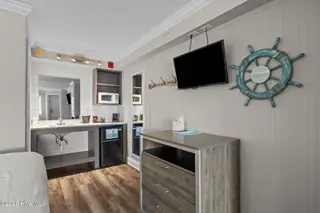 The Islander Suites, Emerald Isle — 1-bedroom condo in The Islander Suites, Emerald Isle, NC, photo 8 of 23: Bathroom/ Kitchenette