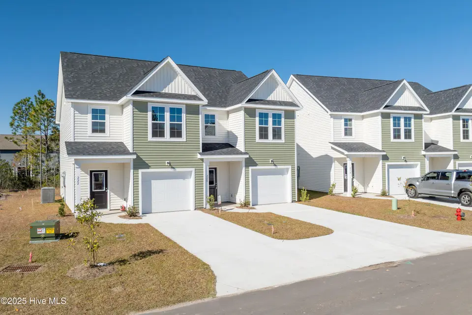 222 Sandpiper Place, Holly Ridge, NC 28445 – photo 1 of 25: 220-222 Sand Piper - Exterior - Edited_6