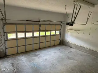 110 Stillwater Court, New Bern, NC 28562 — 3-bedroom home in River Bend, New Bern, NC, photo 14 of 18: Garage Interior