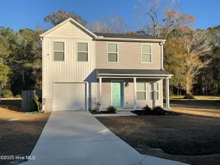 93 Shamrock Drive SW, Sunset Beach, NC 28468 – photo 1: Welcome Home