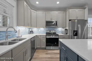 245 NE 64th Street, Oak Island, NC 28465 – photo 17: 33-web-or-mls-DSC04954