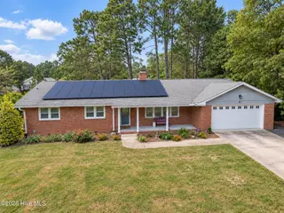 22 Pine Lake Drive, Whispering Pines, NC 28327 – photo 1: Lakefront Living in Whispering Pines