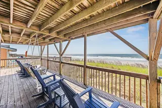 5127 W Beach Drive, Oak Island, NC 28465 – photo 3: 50_deck