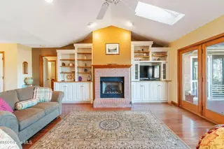 1461 S Shore Drive, Southport, NC 28461 – photo 11: Fire Place Living Room