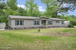 552 Colonial Landing Road SE, Bolivia, NC 28422 – photo 5: 5-web-or-mls-Front ext angle