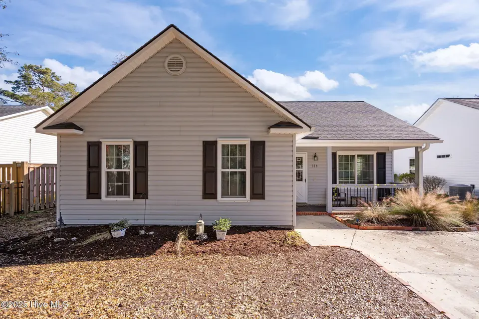 118 NE 31st Street, Oak Island, NC 28465 – photo 1 of 44: 29-web-or-mls-IMG_4656