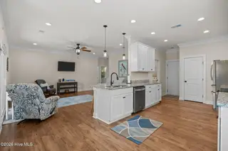 129 NW 11th Street, Oak Island, NC 28465 – photo 9: kitchen-living