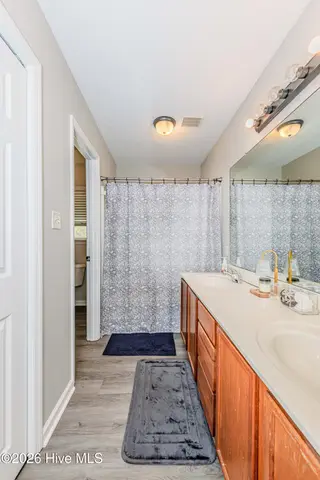 126 Forest Bluff Drive, Jacksonville, NC 28540 — 3-bedroom home in River Hills, Jacksonville, NC, photo 13 of 22: Primary Bath