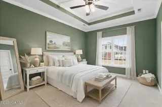 126 Mason Street, Princeton, NC 27569 – photo 9: Coastal serenity in a cozy bedroom