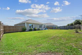 420 St Kitts Way, Winnabow, NC 28479 – photo 21: Backyard