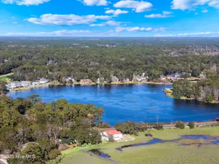 641 Shoreline Drive W, Sunset Beach, NC 28468 – photo 6: DJI_20250107143550_0010_D