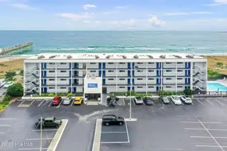 711 S Lumina Avenue 111, Wrightsville Beach, NC 28480 — 1-bedroom condo in Surf Motel Condo, Wrightsville Beach, NC, photo 1 of 16: Surf Suites 111 1