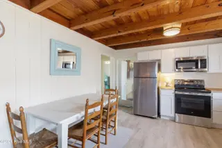 707 W Beach Drive, Oak Island, NC 28465 – photo 20: 11-Dining to Kitchen