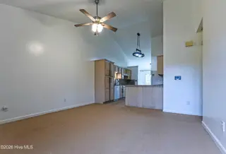 1206 Peyton Circle B, Greenville, NC 27834 – photo 3: Living room and partial kitchen 1206