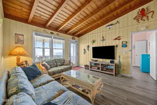 1011 W Beach Drive, Oak Island, NC 28465 – photo 9: 32-web-or-mls-IMG_2407