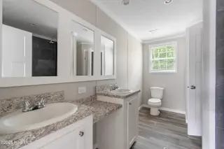 6777 Lewis Drive SE, Winnabow, NC 28479 – photo 15: master bathroom