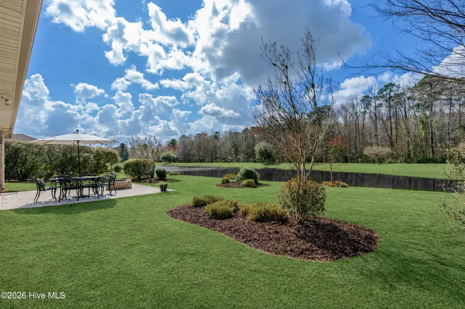 1092 Leesburg Drive, Leland, NC 28451 – photo 1 of 71: Looking at pond green grass