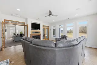 105 Pailin Creek Road, Elizabeth City, NC 27909 — 3-bedroom home in Pailin Creek Landing, Elizabeth City, NC, photo 12 of 56: Den