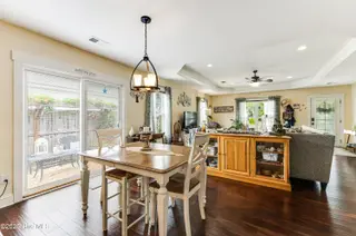 131 NE 33rd Street, Oak Island, NC 28465 – photo 21: dining into living room