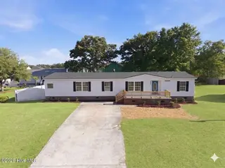 9929 Old Mill Road NE, Leland, NC 28451 — 4-bedroom manufactured home, Leland, NC, photo 1 of 33: 9929 Old Mill front
