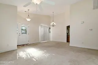 833 Fifty Lakes Drive, Southport, NC 28461 – photo 5: Dinning Room & Front Door