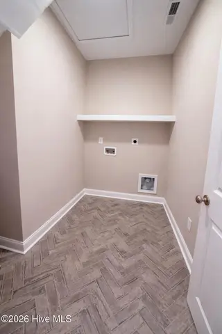 4508 Falconcrest Court, Wilson, NC 27896 – photo 23: Laundry Room