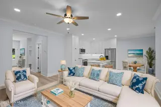 107 Star Lake Circle C, Cape Carteret, NC 28584 – photo 13: 14-web-or-mls-1S3A2542 - Living Room - C