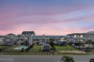 2519 W Dolphin Drive, Oak Island, NC 28465 – photo 7: 12-web-or-mls-_DSC1814 day to dusk