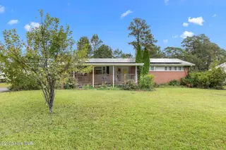 712 Page Drive, Jacksonville, NC 28540 — 4-bedroom home in Northwoods, Jacksonville, NC, photo 1 of 18: Front