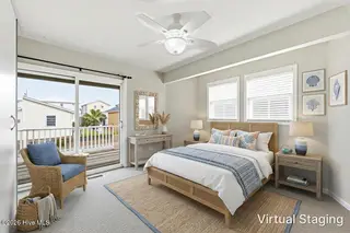 1426 N New River Drive, Surf City, NC 28445 – photo 20: Master Bedroom Virtually Staged