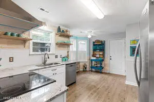 124 NE 15th Street, Oak Island, NC 28465 – photo 8: thumbnail-0196a7bd-040d-7078-ad13-073c4d