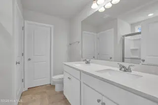 1129 Tennessee Walker Way, Bolivia, NC 28422 — 4-bedroom home in River Tide Farms, Bolivia, NC, photo 10 of 18: Primary Bath