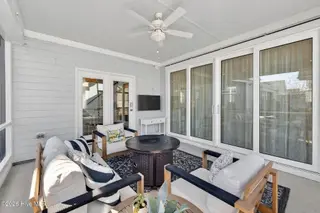 753 Edgerton Drive, Wilmington, NC 28412 – photo 22: Telescoping Doors to Living Room